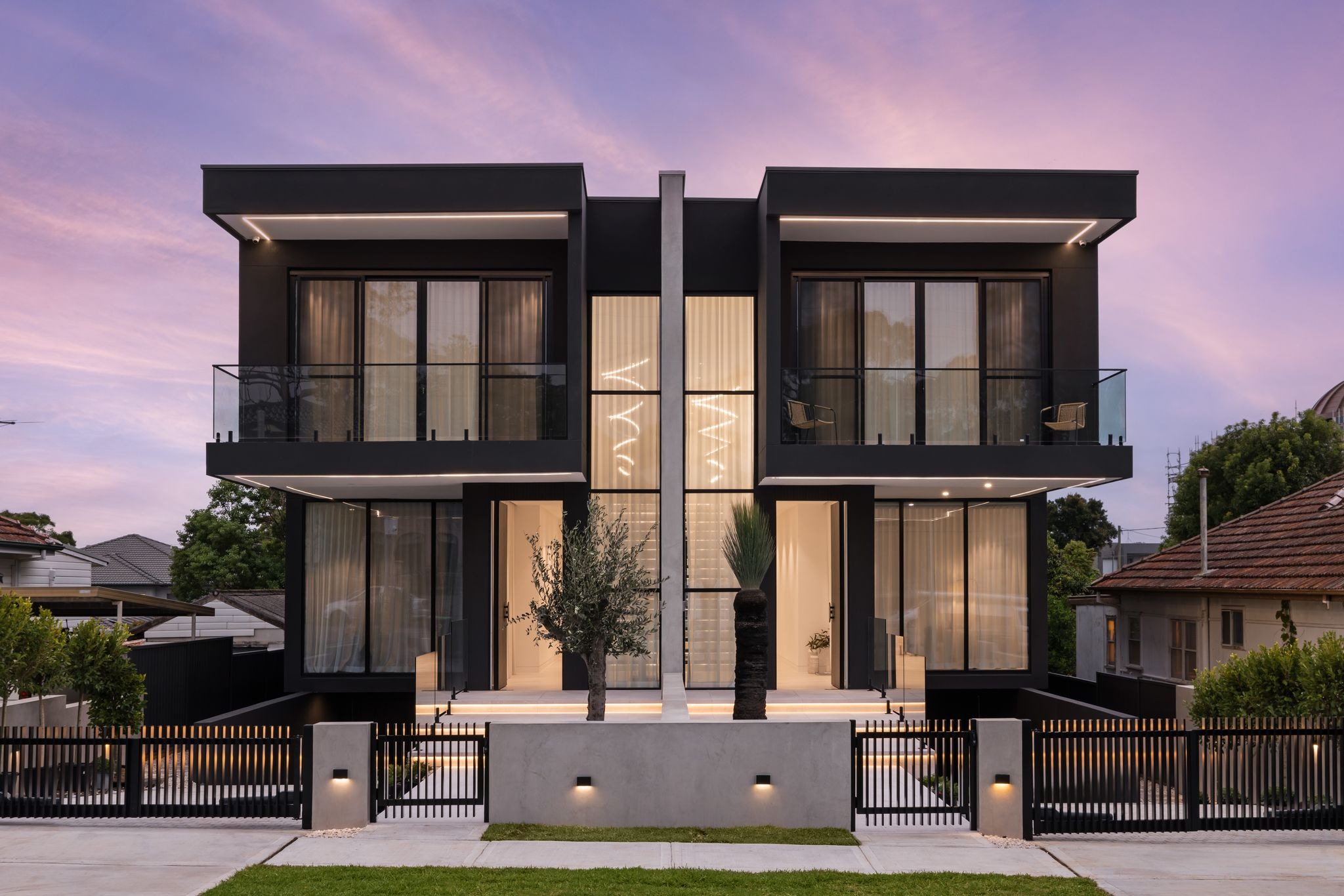 Architectural home illuminated at dusk